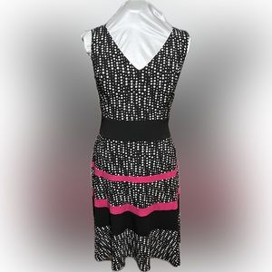 Anne Klein v-neck black and white polka dot sleeveless dress.
